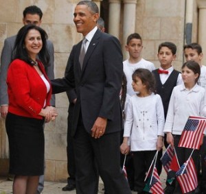 U.S. President Obama is seen next to Bethlehem Mayor Baboun at the Church of the Nativity in Bethlehem
