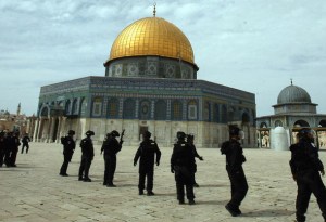 Israeli riot police keep position at Jerusalem's al-Aqsa mosque compound during clashes with Palestinian demonstrators following Friday prayers